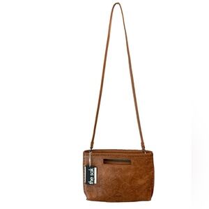 The Sak “Linden” convertible leather crossbody bag.